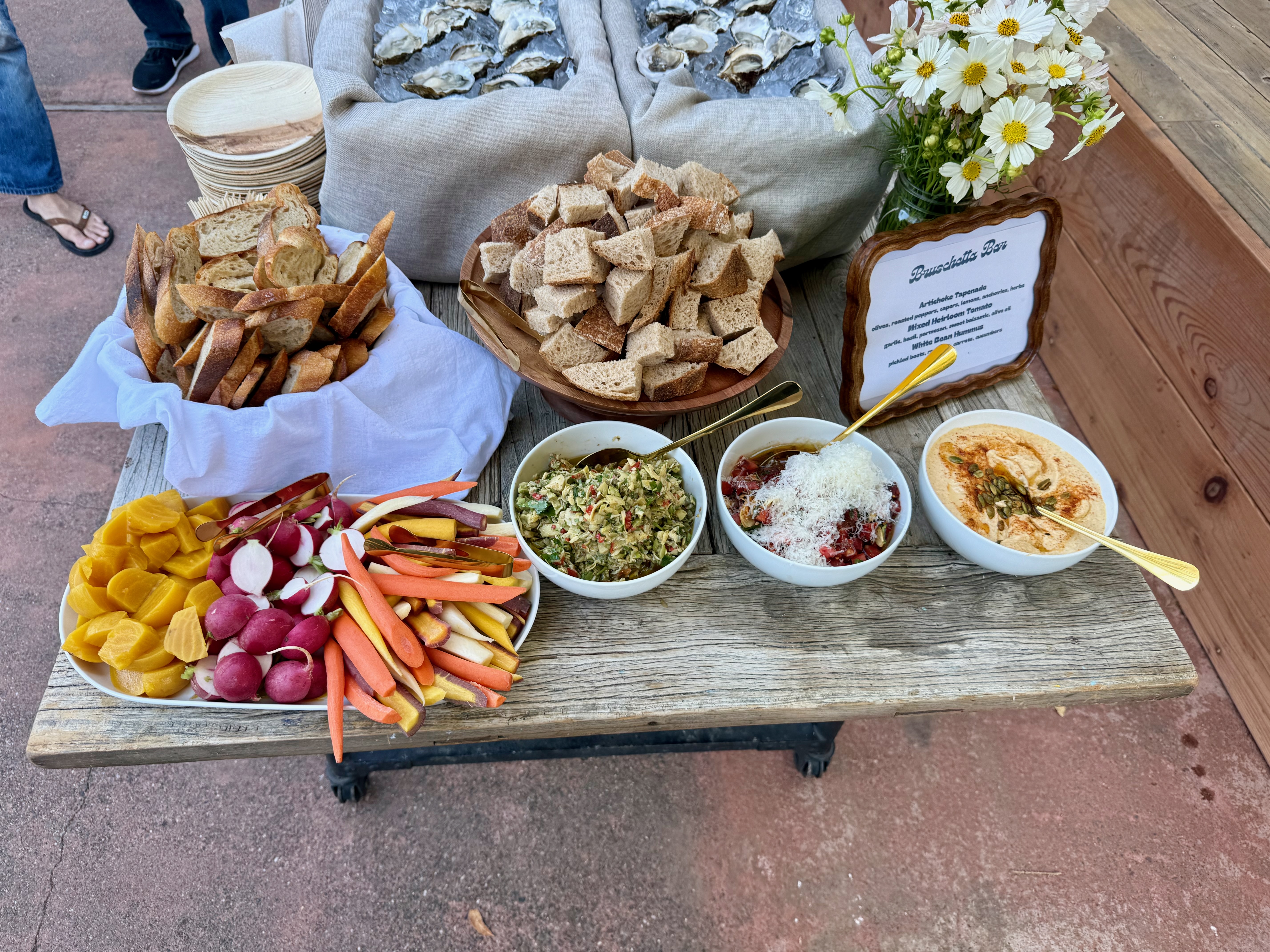 Bruschetta bar with oysters, crudités, and dips