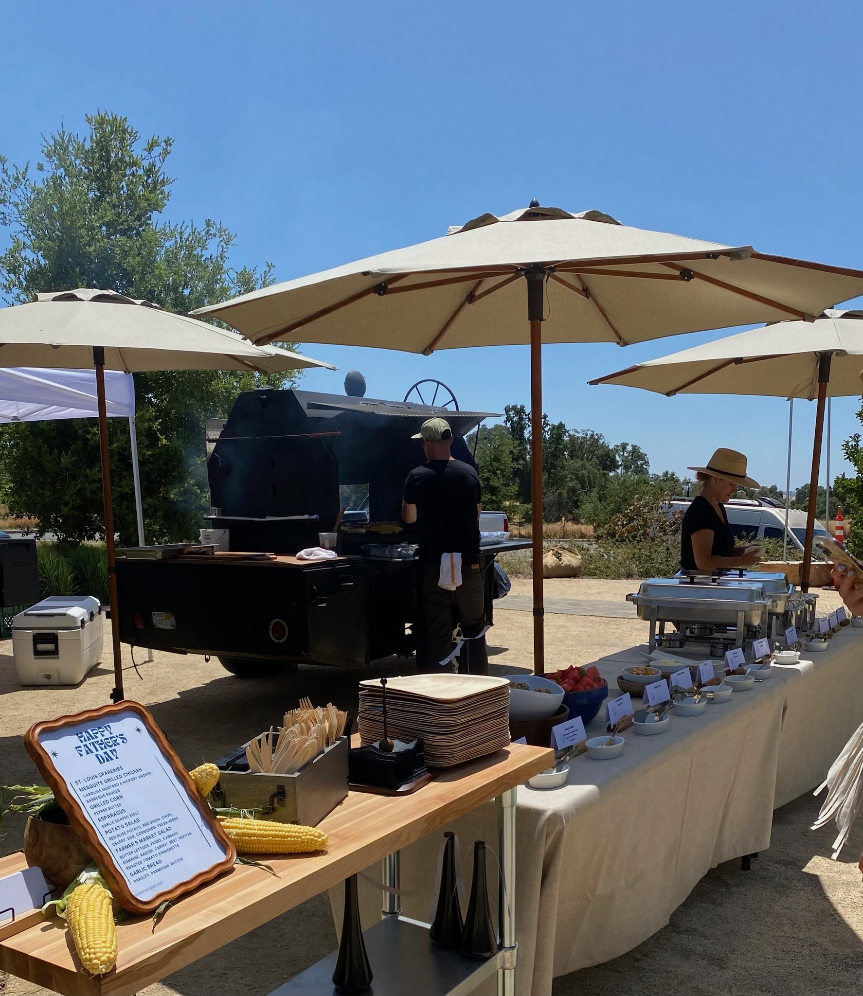 North Fork Feast event setup with smoker and buffet
